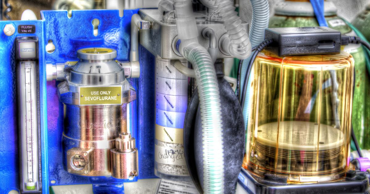 Close-up of anesthesia machine components including a flow meter, vaporizer labeled Close-up of anesthesia machine components including a flow meter, vaporizer labeled